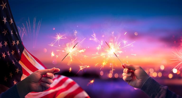 Sparklers and an American flag.